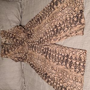 Tacera snake print jump suit